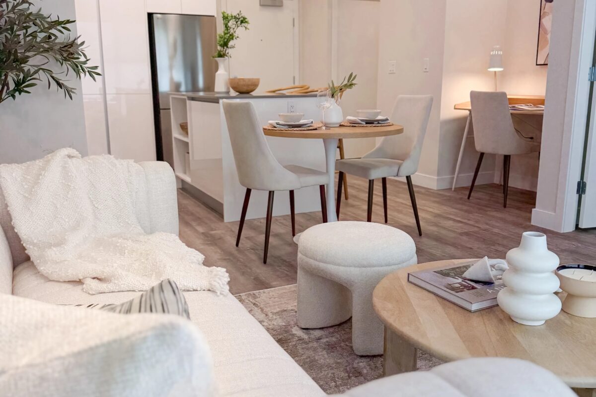 North Point Show Suites living room with a view of kitchen Furniture Connection